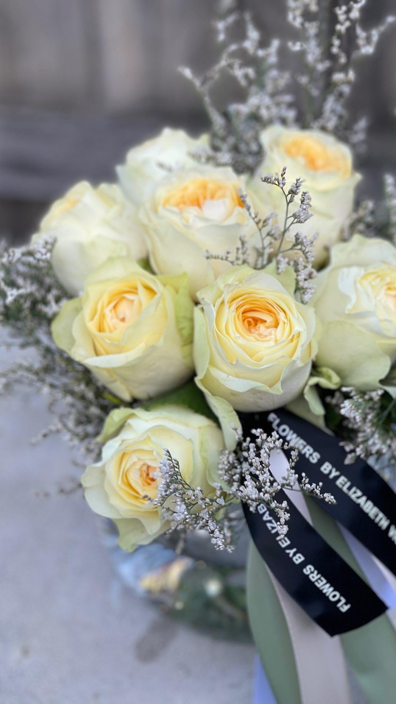 Rose posy in glass fishbowl