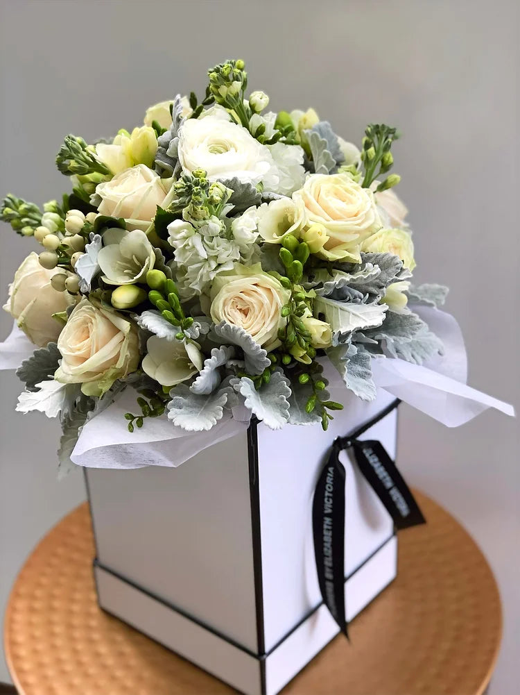 Hat Box of Mixed Seasonal Flowers